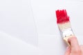 Construction brush in hand on white background. not isolated Royalty Free Stock Photo