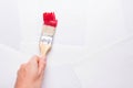 Construction brush in hand on white background. not isolated Royalty Free Stock Photo