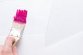 Construction brush in hand on white background. not isolated Royalty Free Stock Photo