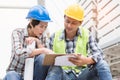 Construction builder teamwork work concept. Top view of engineer and architect planning work. male foreman pointing on blueprint Royalty Free Stock Photo