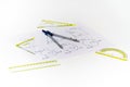 Construction and building concept. Engineers or architect using a Drawing compass with drawings in construction on blueprints in o Royalty Free Stock Photo