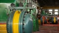 Construction of building interior of factory. Modern industrial building. Equipment and piping as found inside of