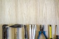 Construction, building and repair tools set for house work on wooden background. Top view. Royalty Free Stock Photo