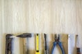 Construction, building and repair tools set for house work on wooden background. Top view. Royalty Free Stock Photo