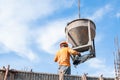 Construction building workers at construction site pouring concrete in form Royalty Free Stock Photo