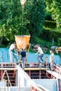 Construction building workers at construction site pouring concrete in form Royalty Free Stock Photo