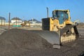 A construction bulldozer moving gravel Royalty Free Stock Photo