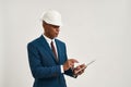 Construction business man browse tablet in studio Royalty Free Stock Photo