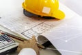 Construction business using plans for electrical systems, energy,Plans and work tools, laptops, calculators Royalty Free Stock Photo