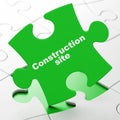 Construction concept: Construction Site on puzzle background