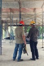 Construction concepts, Engineer and Architect working at Construction Site with blueprint, Royalty Free Stock Photo