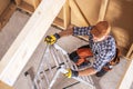 Construction Contractor Worker Climbing on a Ladder Royalty Free Stock Photo