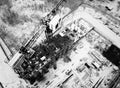 Construction Crane from Above. tower crane on the construction site aerial view. Aerial View Of construction site with Royalty Free Stock Photo