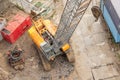 Construction crane boom on crawler tracks, aerial view