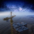 Construction crane, night starry sky and construction site. Royalty Free Stock Photo