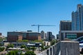 Construction Crane over horizon with traffic heading towards Austin Downtown