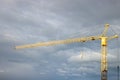Construction crane on sky background