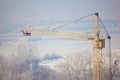 Construction crane working in winter