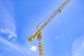 Construction crane, Yellow high power crane on blue sky