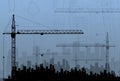 Construction cranes on the background buildings Royalty Free Stock Photo