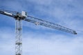 Construction cranes and the blue sky with clouds. industrail concept