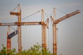 Construction cranes at a building site in a new development area in Germany Royalty Free Stock Photo