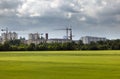 Construction cranes on new buildings in the small city in Germany