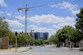 Construction cranes towering over a road in Sandton - Johannesburg