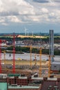 Construction cranes and wind turbines in Hamburg