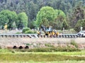 Construction Crew Laying New Pipe At Stanfield Cutoff