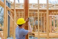 Construction crew working on the roof sheeting of a new, two story, commercial apartment building in Oregon Royalty Free Stock Photo