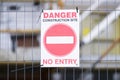 Construction danger no entry sign on entrance fence Royalty Free Stock Photo