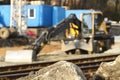 Construction digger, excavation outside the depth of field