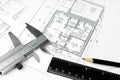 Construction drawings and plan tools. Close-up of Architect engineer drawing plan Royalty Free Stock Photo