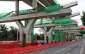 Construction of Electric train in the center of road.