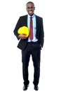 Construction engineer holding hard hat Royalty Free Stock Photo