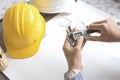 Construction engineer measuring with vernier caliper. Business a Royalty Free Stock Photo