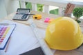 construction engineer office desk architect workplace. engineer drawing objects table with meter, blueprint, hard hat engineering Royalty Free Stock Photo