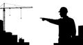 Construction Engineer Pointing at Building Site with Crane Silhouette Royalty Free Stock Photo