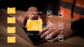 Construction engineer using laptop with virtual data folder interface. Concept of digital project management, industrial document Royalty Free Stock Photo