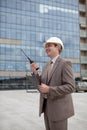 Construction engineering worker/manager on radio Royalty Free Stock Photo