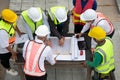 Construction engineers, architects, and foremen form a group.