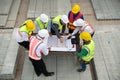 Construction engineers, architects, and foremen form a group.