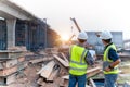 A construction engineers discussion with architects at road construction site. Civil Engineer Royalty Free Stock Photo