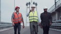 Construction engineers walking on highway ramp