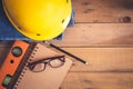 Construction equipment on old wood table