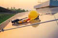 Construction equipment tools with solar panels or solar cells on the roof in farm. Power plant with green field, renewable energy Royalty Free Stock Photo