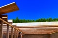 Construction features wooden beams supporting new structure under work day Royalty Free Stock Photo
