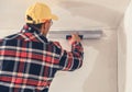 Construction Finishing Worker Patching Drywall Royalty Free Stock Photo