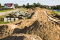 Construction of a floodbank or levee along a river